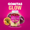 Evolution GLOW Hair Skin & Nails Vitamins in a colorful packaging surrounded by passion fruit.